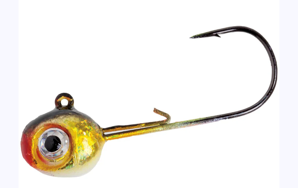 A close-up of a shiny golden fish hook crafted from premium material, featuring a realistic eye design near the hook's base. It's your favorite jig, set elegantly against a plain white background.